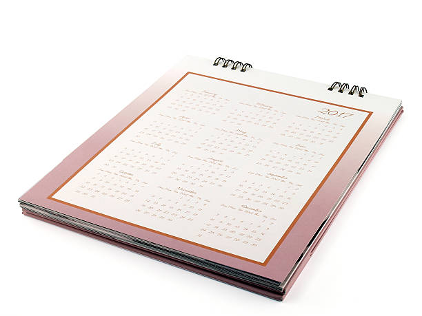 istock desk calendar with days dates and months in 2017 636625338