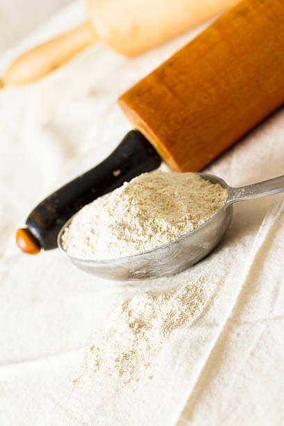 istock Vintage Wooden Rolling Pins On An Old Kitchen Cloth 636625816