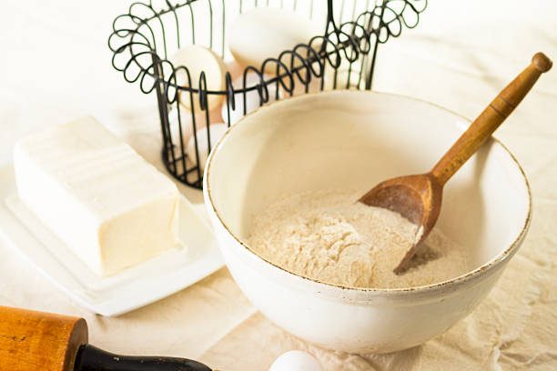 istock Vintage Wooden Rolling Pin Resting On An Old Kitchen Cloth 636626264