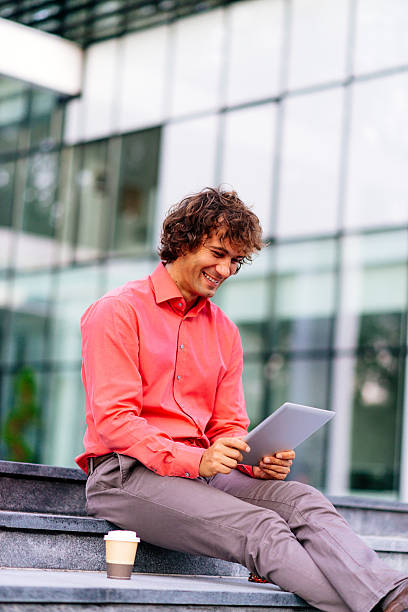 istock Reading news feed on digital tablet 636631206