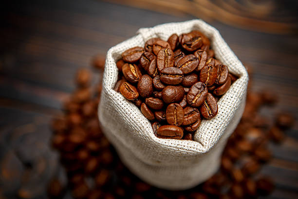 istock roasted coffee beans on wooden background 636632548