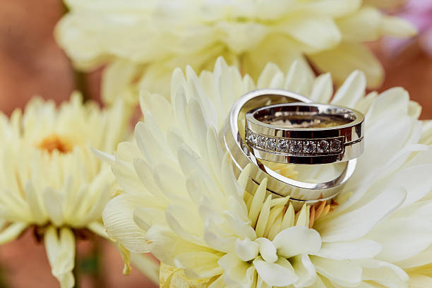 istock Wedding rings white dahlias love Valentine's Day 636632582