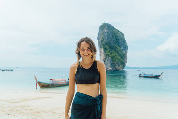 istock Woman on the beach in Thailand 636633312