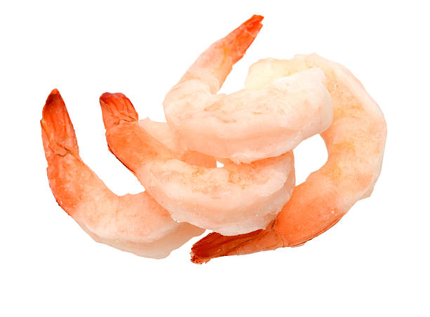 istock cooked fantail prawns isolated on white 636637068