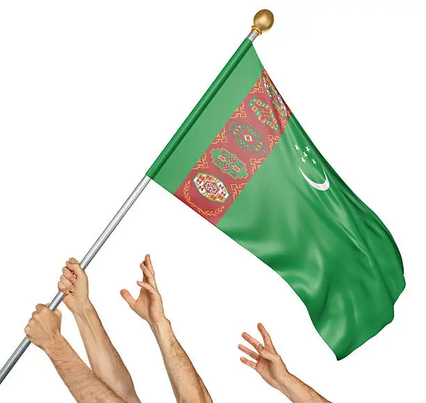 Photo of Team of peoples hands raising the Turkmenistan national flag