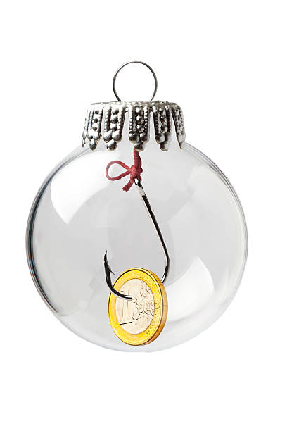 istock Hook and a 1 Euro in a Christmas Ornament 636651282