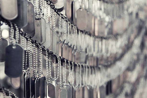 A small garden memorial by the Old North Church in Boston - dog tags representing fallen military personnel.