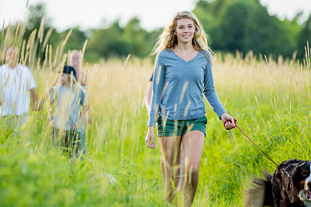 istock Walking the Family Dog 636657876