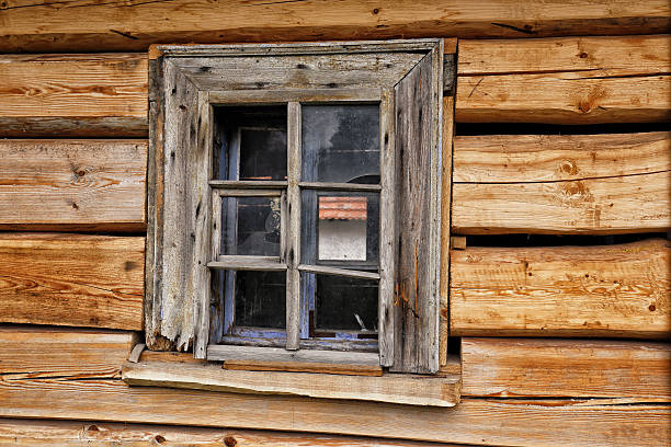 istock Old wooden window on the curbed wall 636658720