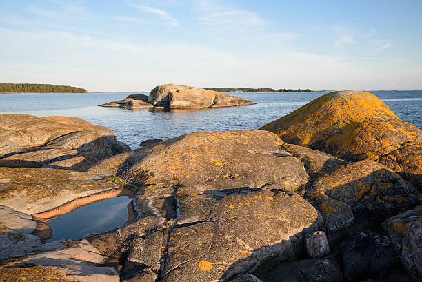 istock Krakskar island landscape with rocks at sunset 636659596
