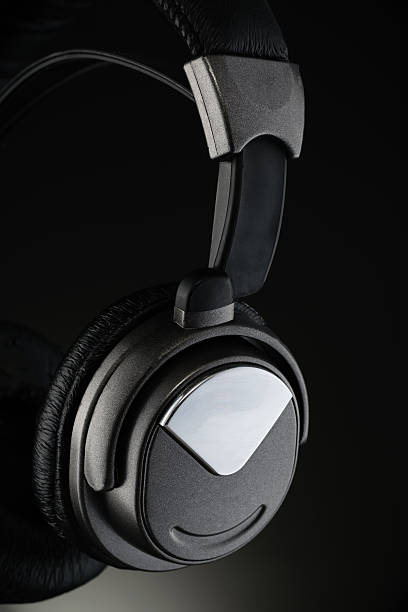 istock Wireless headphones isolated on black 636660392
