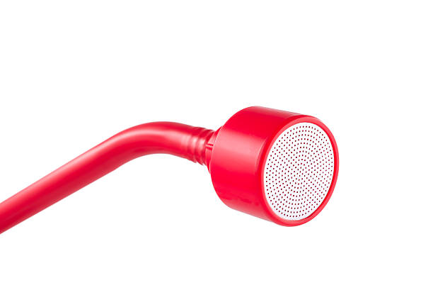 Red watering nozzle isolated on white background stock photo
