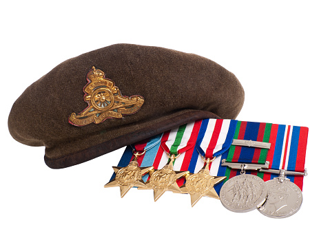 Canada -  Circa 1945: World War II soldier's beret and medals made in Canada showing a ground troups beret and medals over white background, circa 1945