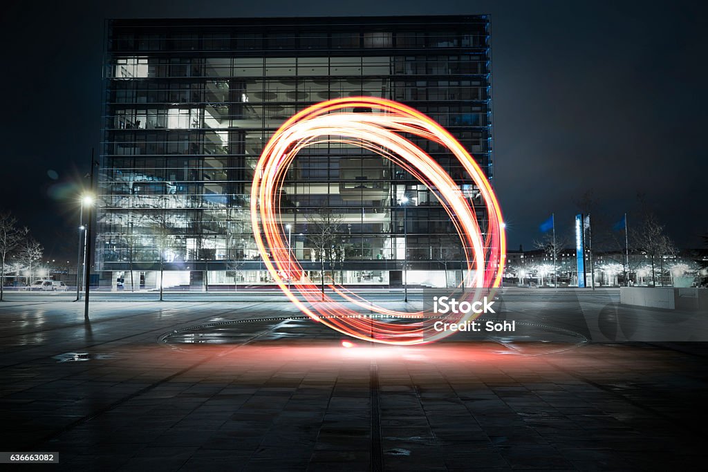 Light paint in the city Light painting - circles drawn with lights in the big city at night Innovation Stock Photo