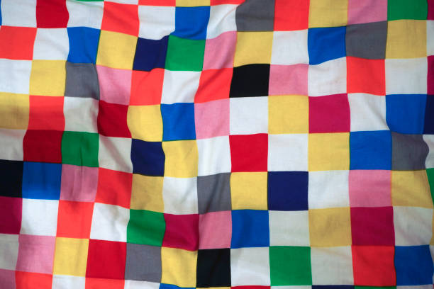 istock Brightly coloured plaid woven fabric 636665850