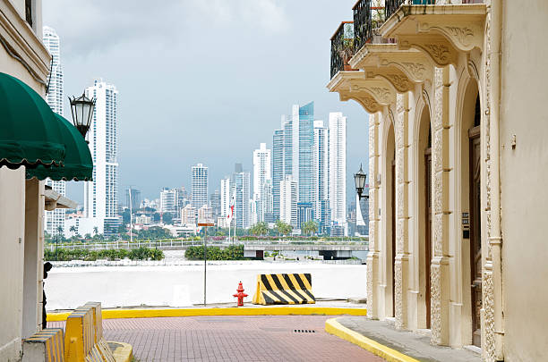 Panama City, Panama - December 14, 2025: Tourists taking photos of the skyscrapers in the financial district of Panama City, Panama.