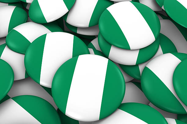 ナイジェリアバッジの背景 - ナイジェリアの旗ボタンの山 - nigerian flag nigerian culture three dimensional shape nigeria ストックフォトと画像