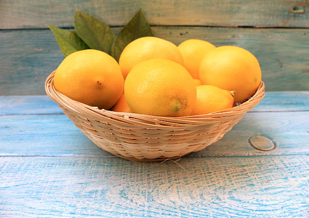 istock Ripe yellow lemons in a basket 636672380