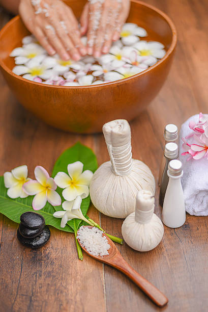 istock Spa massage compress balls, herbal ball on the wooden. 636681730