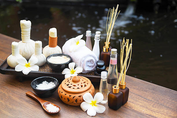 istock Spa massage compress balls, herbal ball on the wooden. 636681748