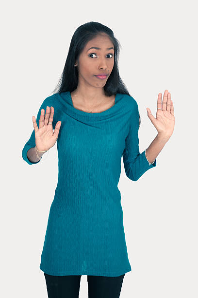 istock Beautiful woman doing different expressions in different sets of clothes: innocent 636684838