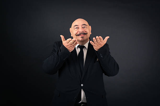 istock Handsome man doing different expressions in different sets of clothes: hungry 636685508
