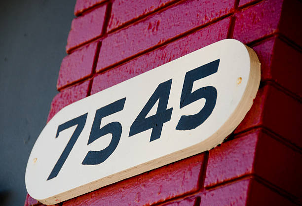 istock House number on a red brick wall 636688942