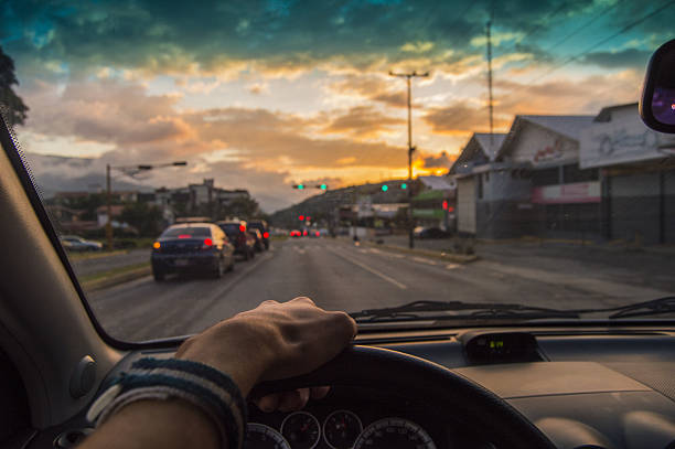 istock Driving at sunset. View from the driver angle,closeup car 636688960