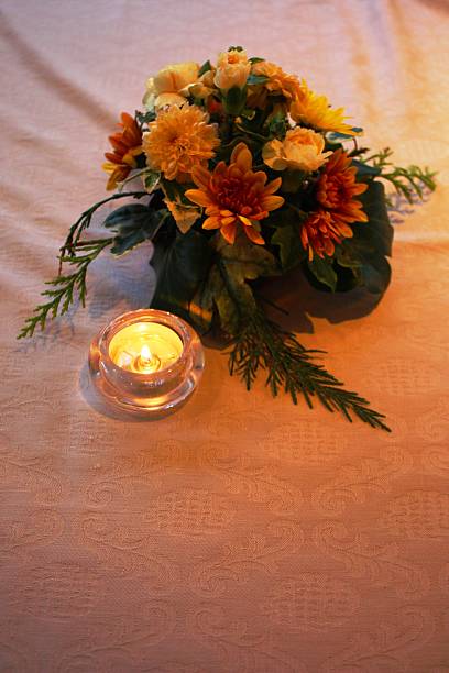 istock small table decoration of yellow and white flowers 636690138