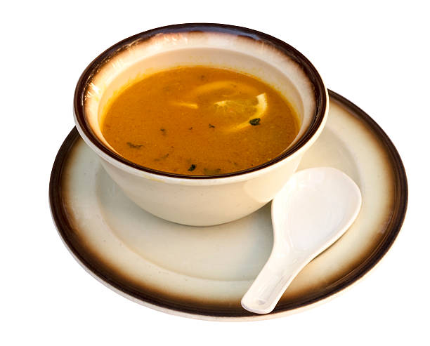 istock Bowl of chicken soup with lemon, isolated on white 636690480