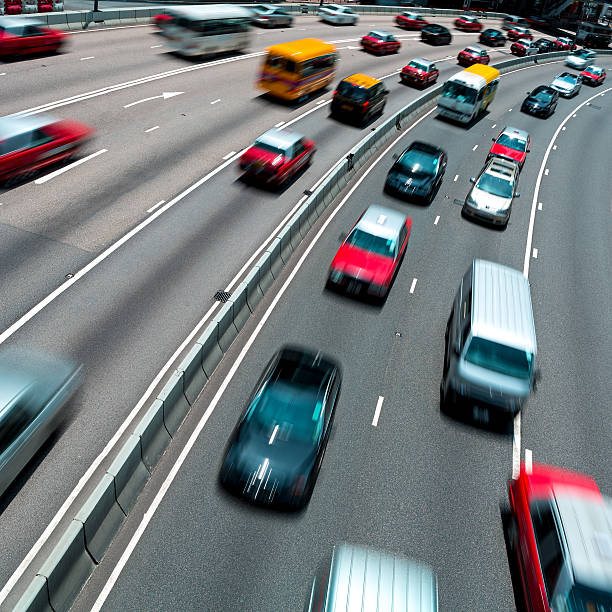 istock Traffic on multiple lane highway with motion blur 636690516