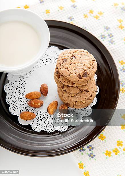 Chocolate Chip Cookies With Milk In Cup Stock Photo - Download Image Now - Baked, Block Shape, Breakfast