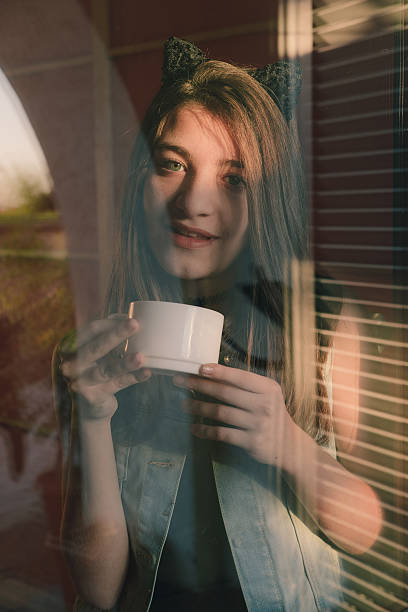 istock Teen Girl Drinking coffee 636697032