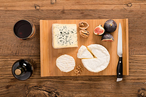 istock above flat lay assortment cheese tray red wine wooden background 636699398