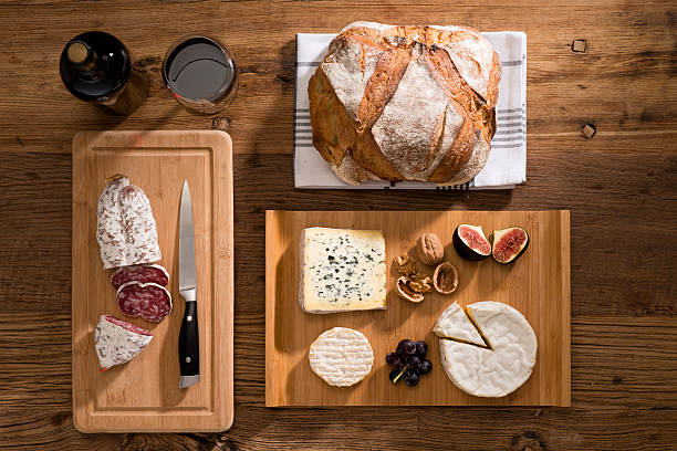 istock above flat lay cheese tray red wine appetizer wooden background 636699898