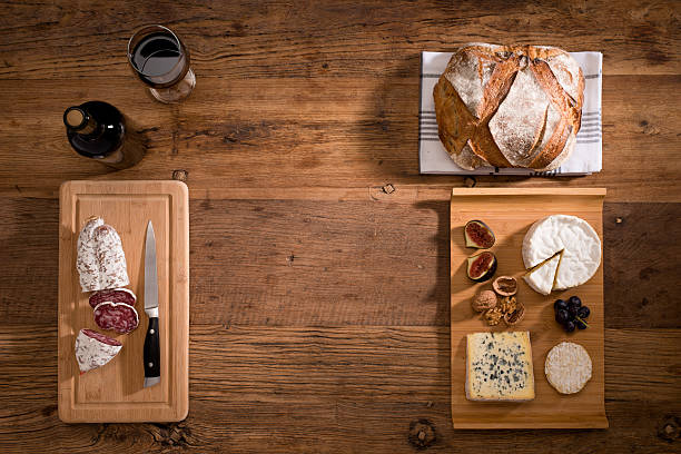 istock above flat lay cheese tray red wine appetizer wooden background 636700120