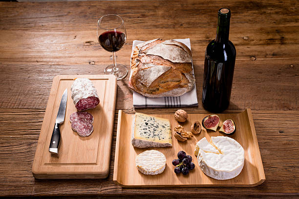istock above flat lay cheese tray red wine appetizer wooden background 636700278