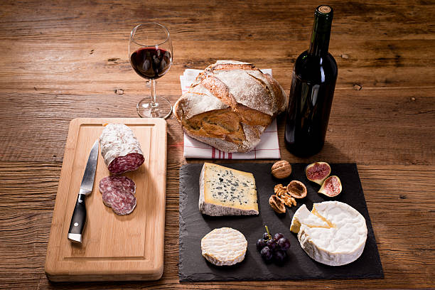 istock above flat lay cheese tray red wine appetizer wooden background 636701412