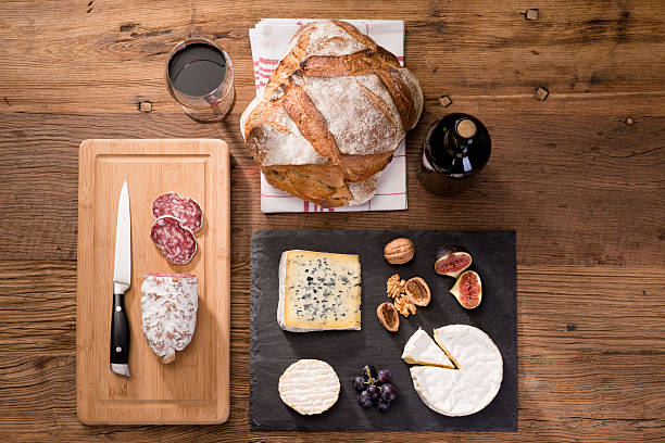 istock above flat lay cheese tray red wine appetizer wooden background 636701574