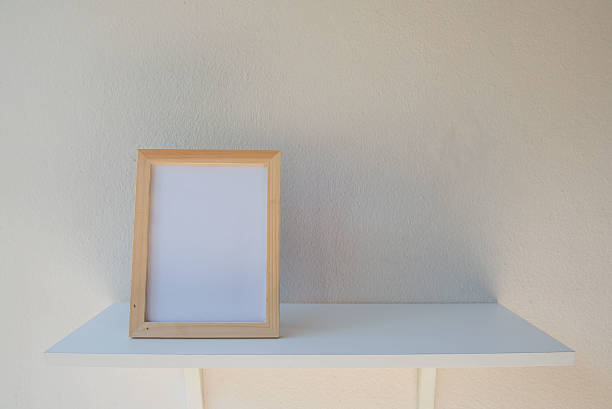 istock photo Frame on a wooden on White background 636705410
