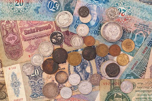istock The old coins and banknotes. 636705510