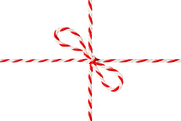 istock White Red Rope Tied Bow, Postal Ribbon, Isolated Twine Cord 636706894