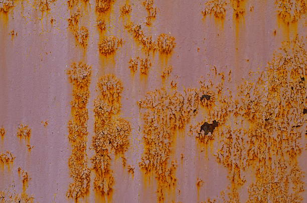 vintage rostige eisenwand mit vielen flecken farbe - metal rust fungus paint cracked stock-fotos und bilder