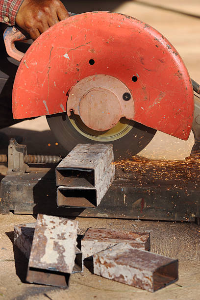 istock cutting metal and steel with compound mitre saw with sharp 636707750