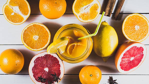 istock Citrus on a light wooden table 636710208