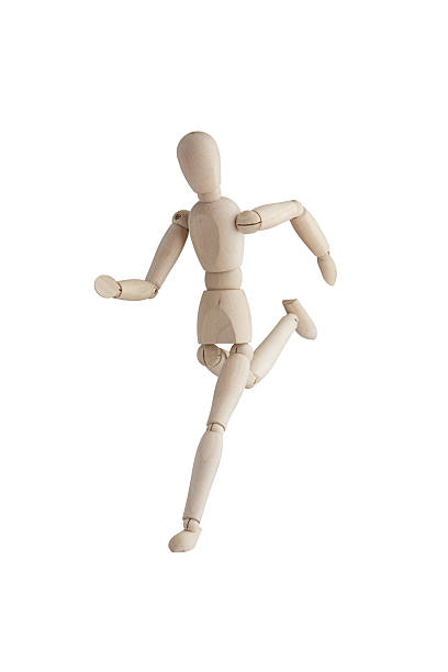 istock Wooden mannequin with running pose 636710234