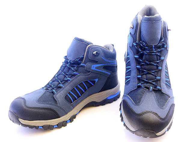 istock Trekking shoes isolated on white background 636712814