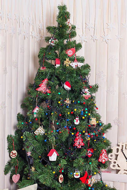 istock Beautifully decorated christmas tree with ribbons and ornaments shot 636714934