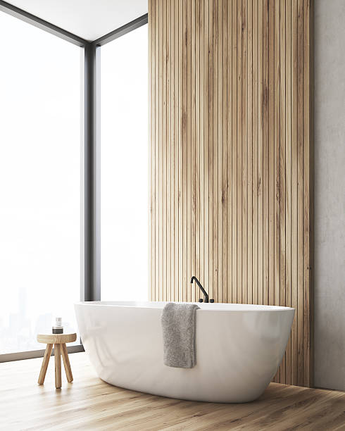 istock bathroom with bathtub and a small wooden chair 636715016