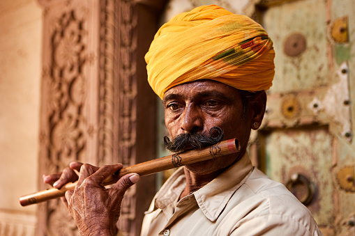 Indian musicians playing flute, Jodhpur, Rajasthan, India.http://bhphoto.pl/IS/rajasthan_380.jpg